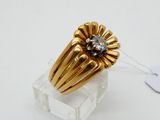 an image of a gold ring with a diamond on top of it