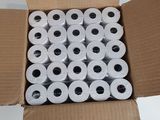 many rolls of toilet paper in a cardboard box