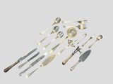 a lot of silver spoons and forks on the table