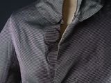 an image of a woman ' s shirt and tie on a mannequin mannequin