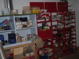a room filled with lots of boxes and shelves