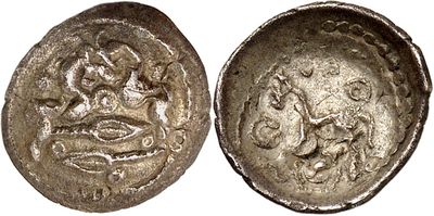 a silver coin with an image of a man and a woman on it