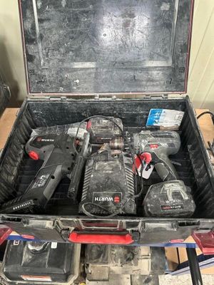 a tool box with tools in it on a table