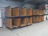 many boxes stacked on the shelves in the warehouse