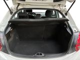 a trunk of a car with the back seats folded down