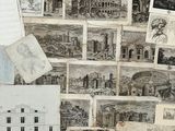 a lot of drawings on the wall of this room
