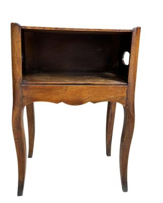 an image of a small wooden table with a drawer on it