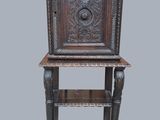 an old wooden shelf with a shelf on top of it
