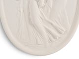an image of a white relief of a woman holding a baby