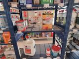 a shelf full of cleaning products in a store