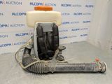 a close up of a blow dryer sitting on a table in front of a wall