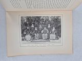 an old picture of a group of people sitting on a bench