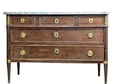 an antique chest of drawers with marble top and brass handles