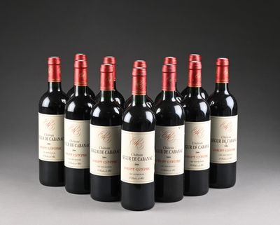 six bouteilles de vin rouge alignées