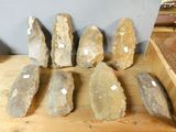 several pieces of rock sitting on top of a wooden table