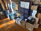 many boxes stacked on top of each other on the floor