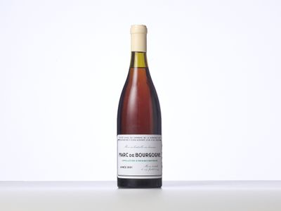 a bottle of wine that is sitting on a table