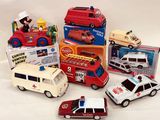 a lot of toy cars that are sitting on a table