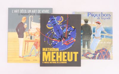 three books that are sitting on a table