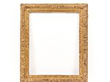an antique gold frame with a white background