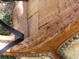 a close up of a bench made out of wood