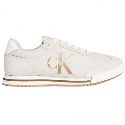 a white sneakers with the letter k on the side