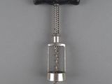 a bottle opener that is attached to a cork stopper