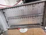 an image of a metal box with a clock inside of it