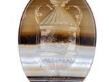 a picture of a glass plate with a picture of a vase on it