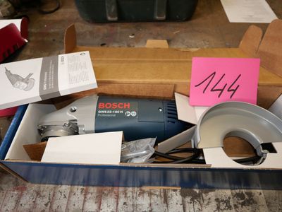 a box of tools that are sitting on the floor