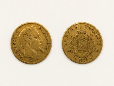 deux souverains d'or, dont l'un est orné d'une couronne et l'autre est un souverain