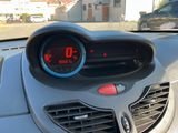 a car dashboard with a digital clock on it
