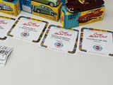 a table with a lot of toy cars on it