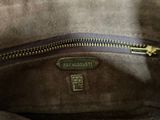 a close up of a purse with a zipper on it