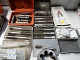 many different tools that are sitting on a table
