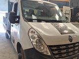 a white van that is parked in a garage