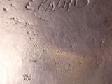 an antique silver plate with the word paris engraved on it