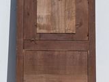 an old wooden door on the side of a building