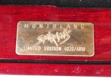 an image of a close up of a gold plate on a wooden table