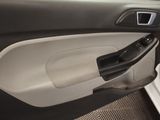 a close up of a door handle in a car