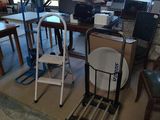 a room with a table, chairs, and a chair in it