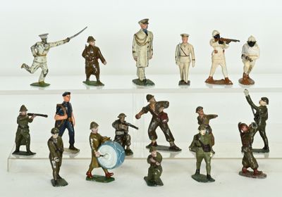 many figurines of soldiers on display on a shelf