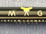 an image of a close up of a mascara tube on a table