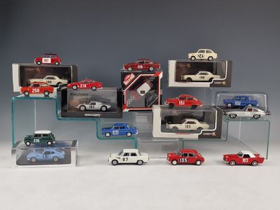 a lot of toy cars on display in a display case