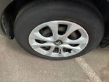 a close up of a tire on a car ' s rim