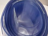 a plastic container with a blue lid sitting on a table