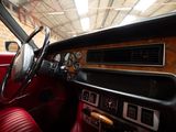 a car dashboard with a steering wheel and a dash board
