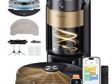 une photo d'une cafetière noire et dorée équipée d'une télécommande