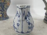 three vases that are sitting on a table