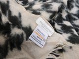 an image of a scarf with a tag on it